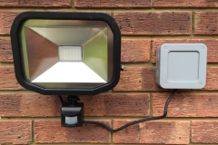 Fitting of a 30W PIR security light and weatherproof junction box