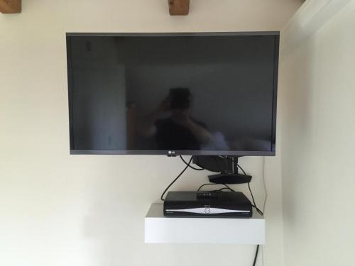 Wall mounted TV and unit